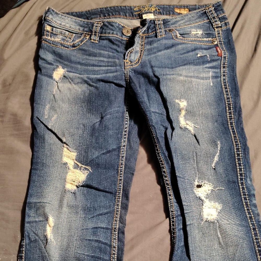 Distressed Blue Jeans with Fading and Whiskering